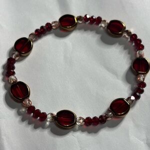 Handmade stretch bracelet gold tone lined red glass and red and rose gold Czech